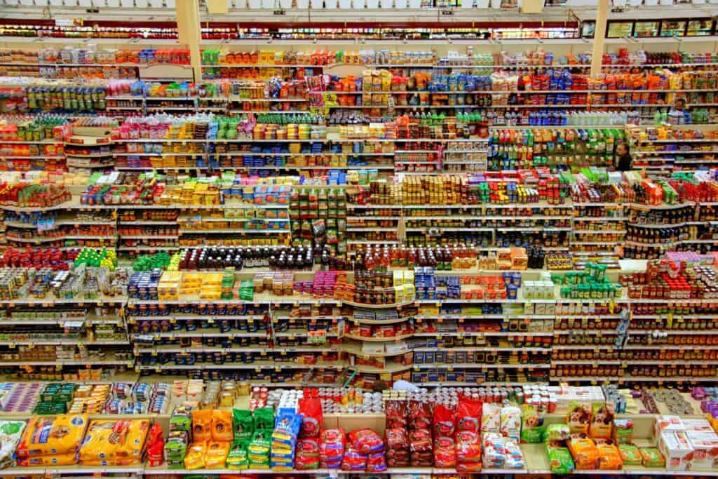 Shopping at local grocery stores when travelling is to pick up souvenirs