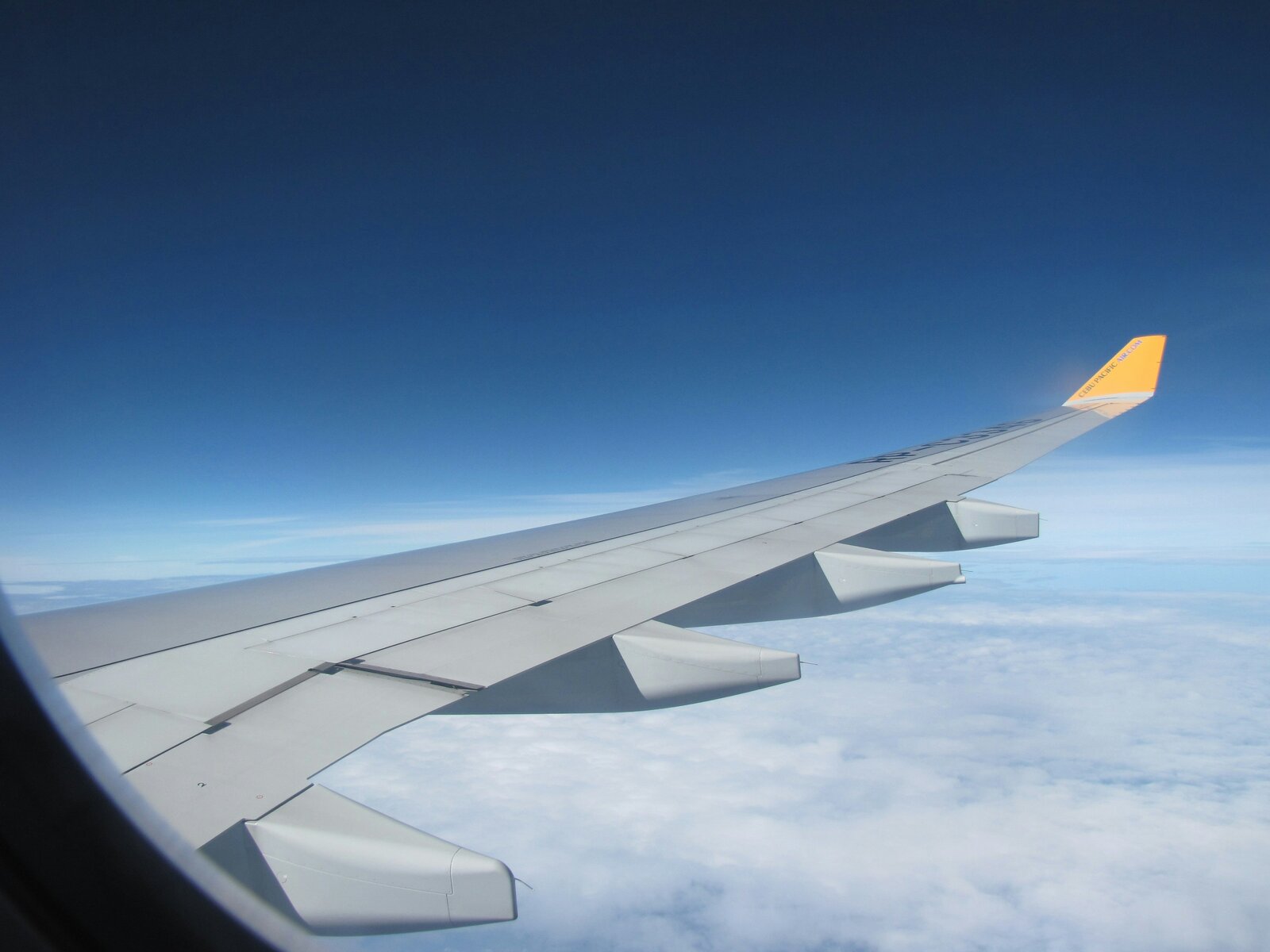 Sit over the wing to minimise turbulence